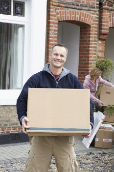 Furniture pick-up team collecting bulky items in a Holland Park flat