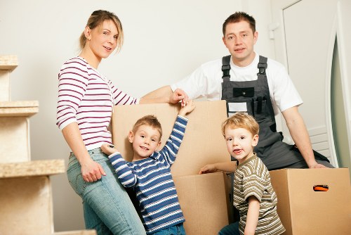 Packing office equipment and furniture for a business move in West London