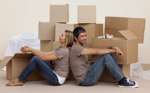Professional removals team planning a move near Holland Park