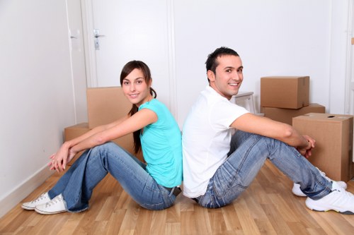 Boxes and household items prepared for a Holland Park man and van removal