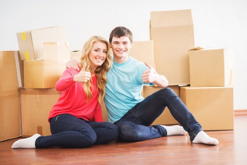 Packed boxes and furniture loaded into a van for a Holland Park move