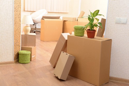 Loading furniture into a removals van in West London