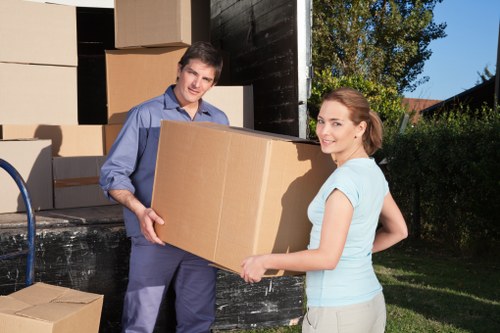 Boxes and furniture being loaded for a Holland Park relocation