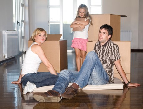 Local unpacking service setting up rooms in a Holland Park residence